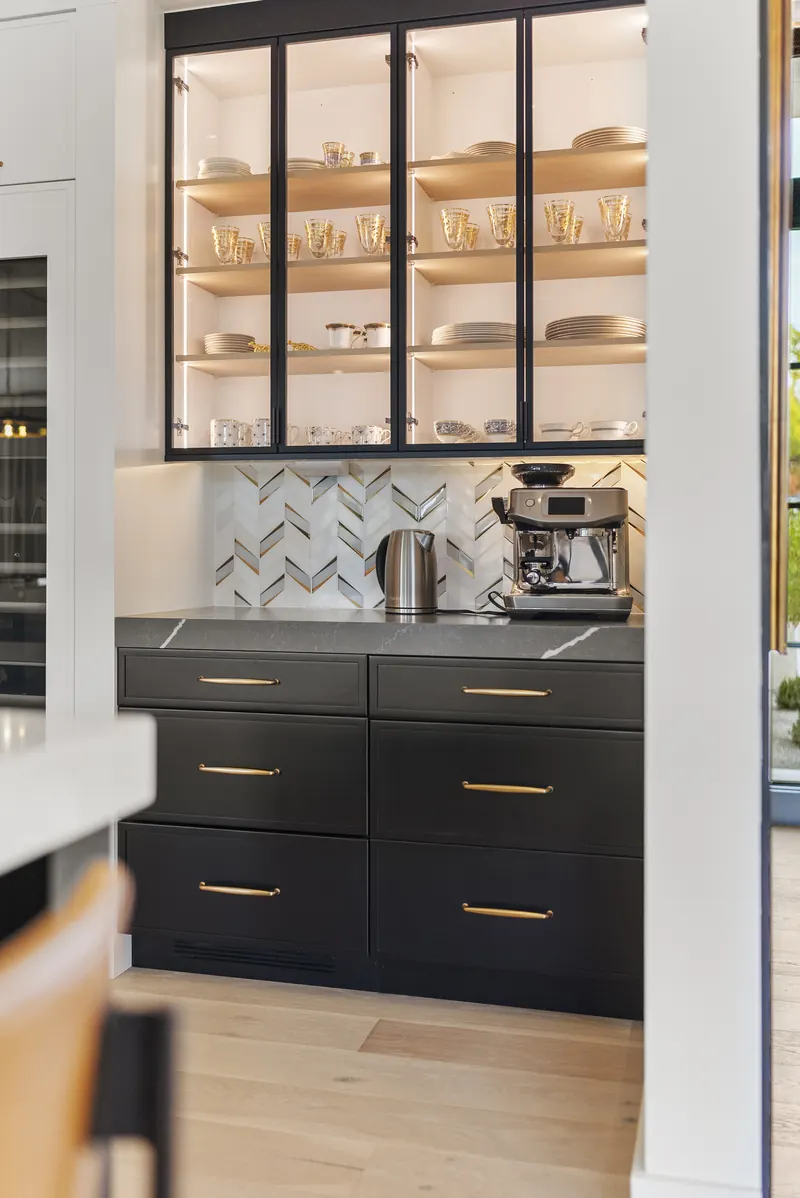 Herringbone backsplash and stone counters, Cherry Hills Village residence