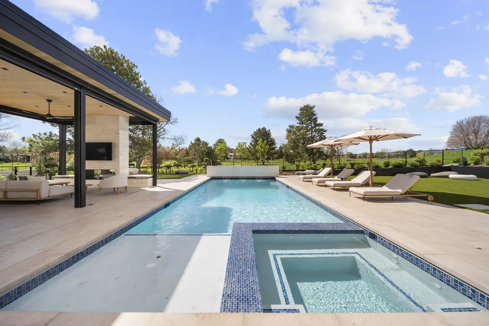 Stone coping, deck and mosaic waterline, Cherry Hills Village residence