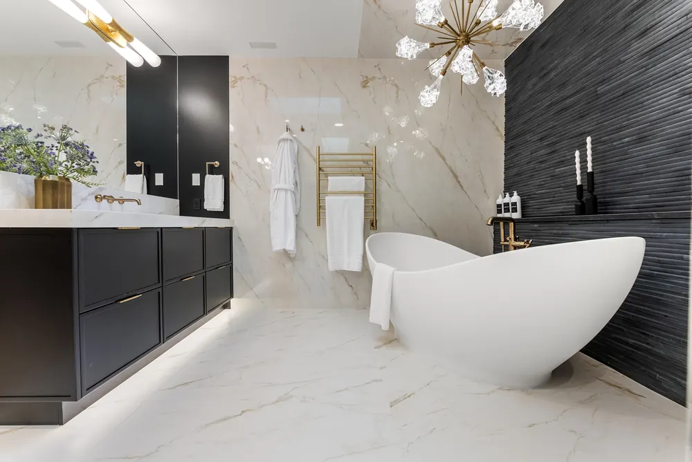 Primary bath with large-format marble-look floors and walls, Cherry Hills Village residence